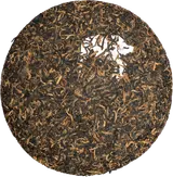 Unwrapped Bulang shu pu-erh tea cake