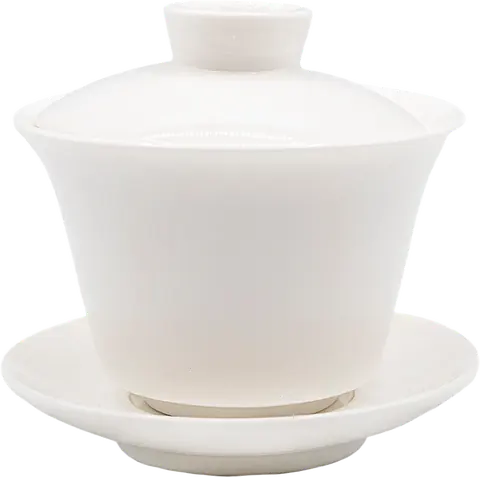 Tall white Dehua gaiwan with central lid knob and matching saucer