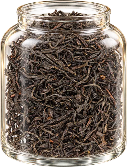 Red Jade black tea leaves in a clear glass display jar