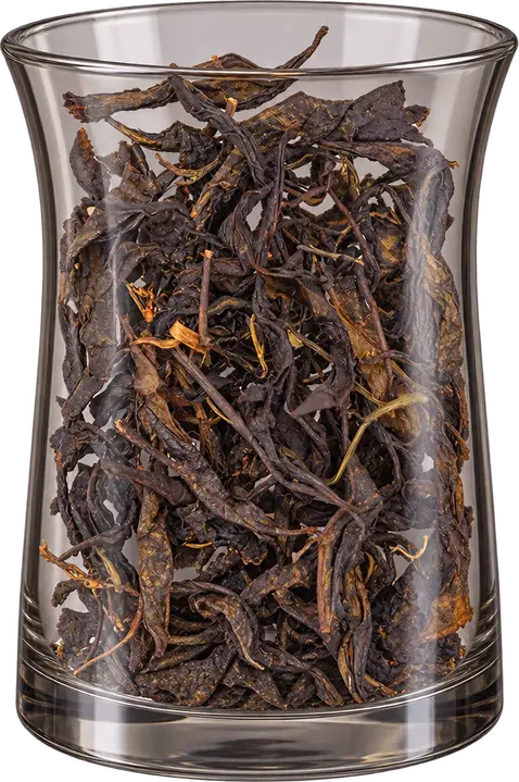 Khili GABA tea leaves in a flared glass display vessel