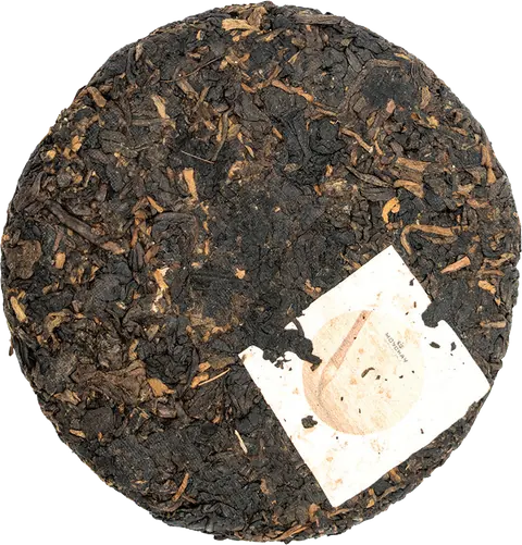 Small unwrapped Shu Long tea cake