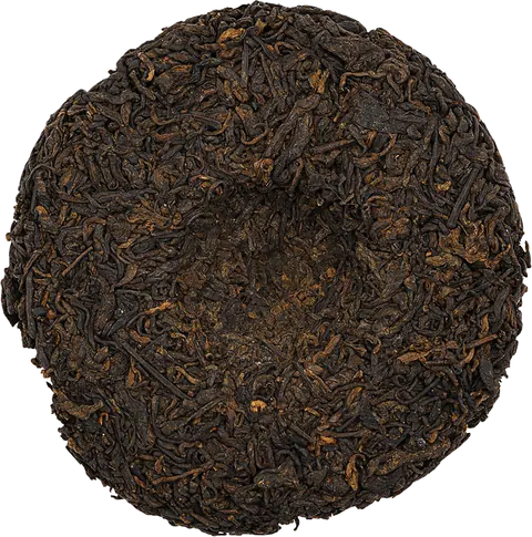 Unwrapped Vietnamese old-tree shu pu-erh tea cake